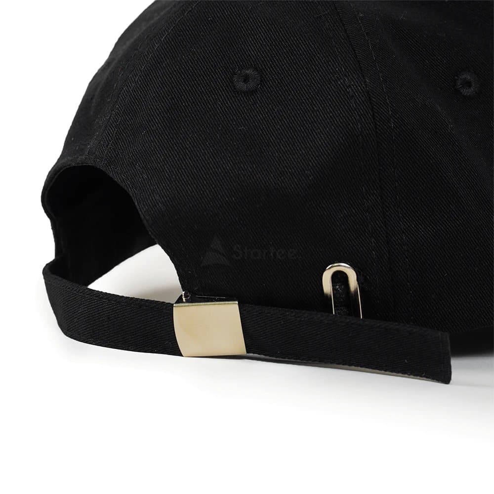 Black cotton twill baseball cap with a metal buckle strap at the back