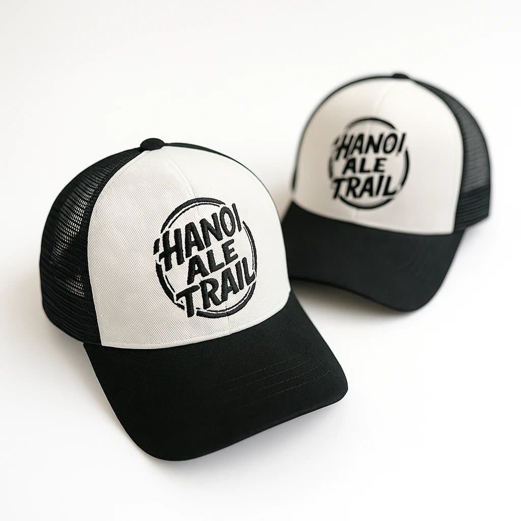 Trucker caps with a white front panel, black mesh back and an embroidered text logo