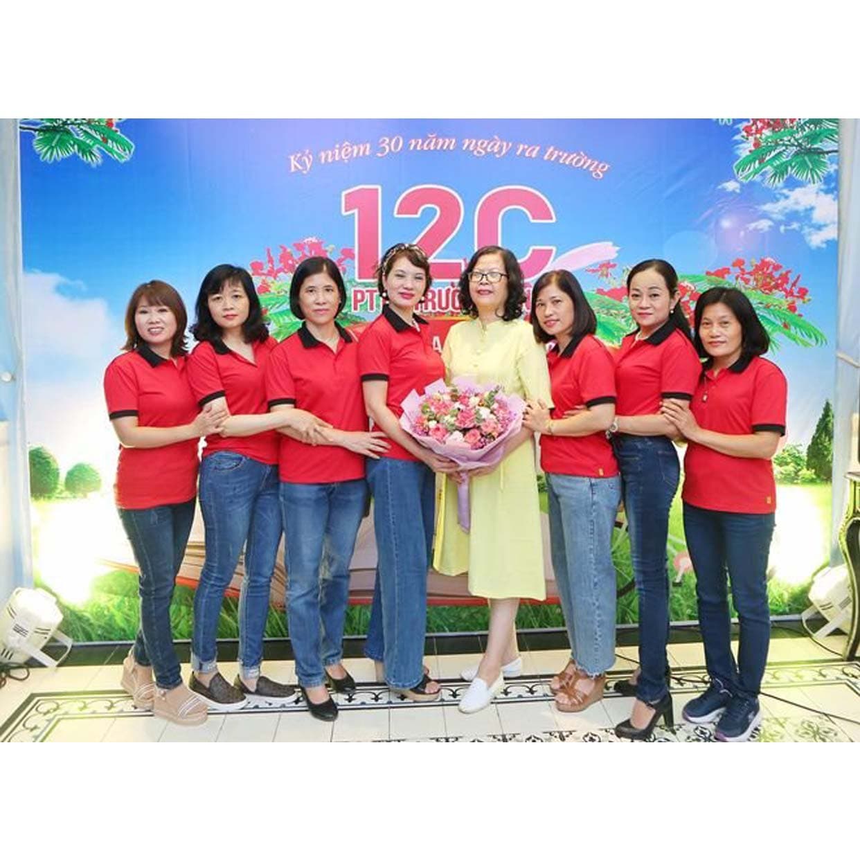 Red polo shirts with black collars for class 12C’s 30-year reunion, made by Startee