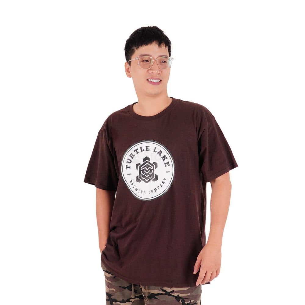 Brown t-shirt with round Turtle Lake Brewing Company logo print — DTG printing by Startee