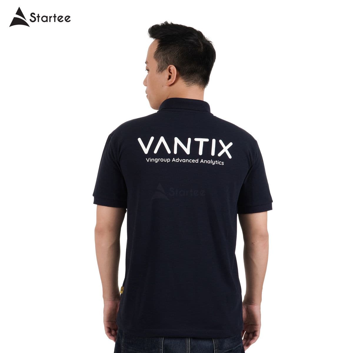 Navy polo with VANTIX printed on the back, made by Startee