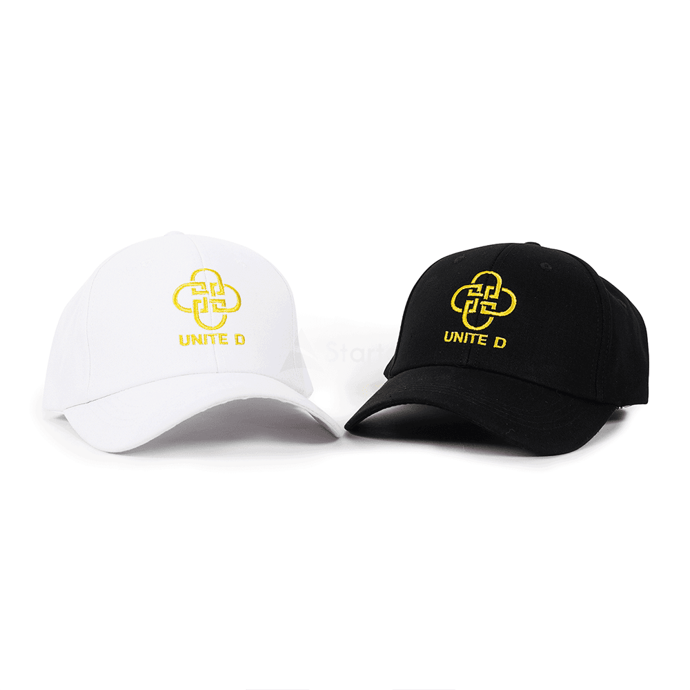 Embroidered UNITE D logo caps made by Startee, in white and black